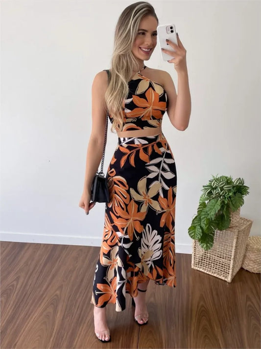 Women's Summer Vacation suit Leisure Print Hanging Strap Neck Top Tie up Half Skirt Beach Style Women's Elegant Two Piece Set